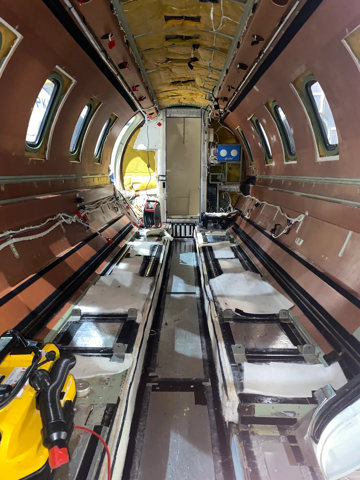During the work: the cabin with its interior fittings removed.