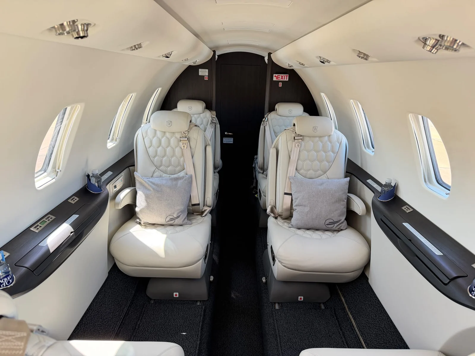 After: geometric seat stitching, embroidered headrests and coordinated interior surfaces.