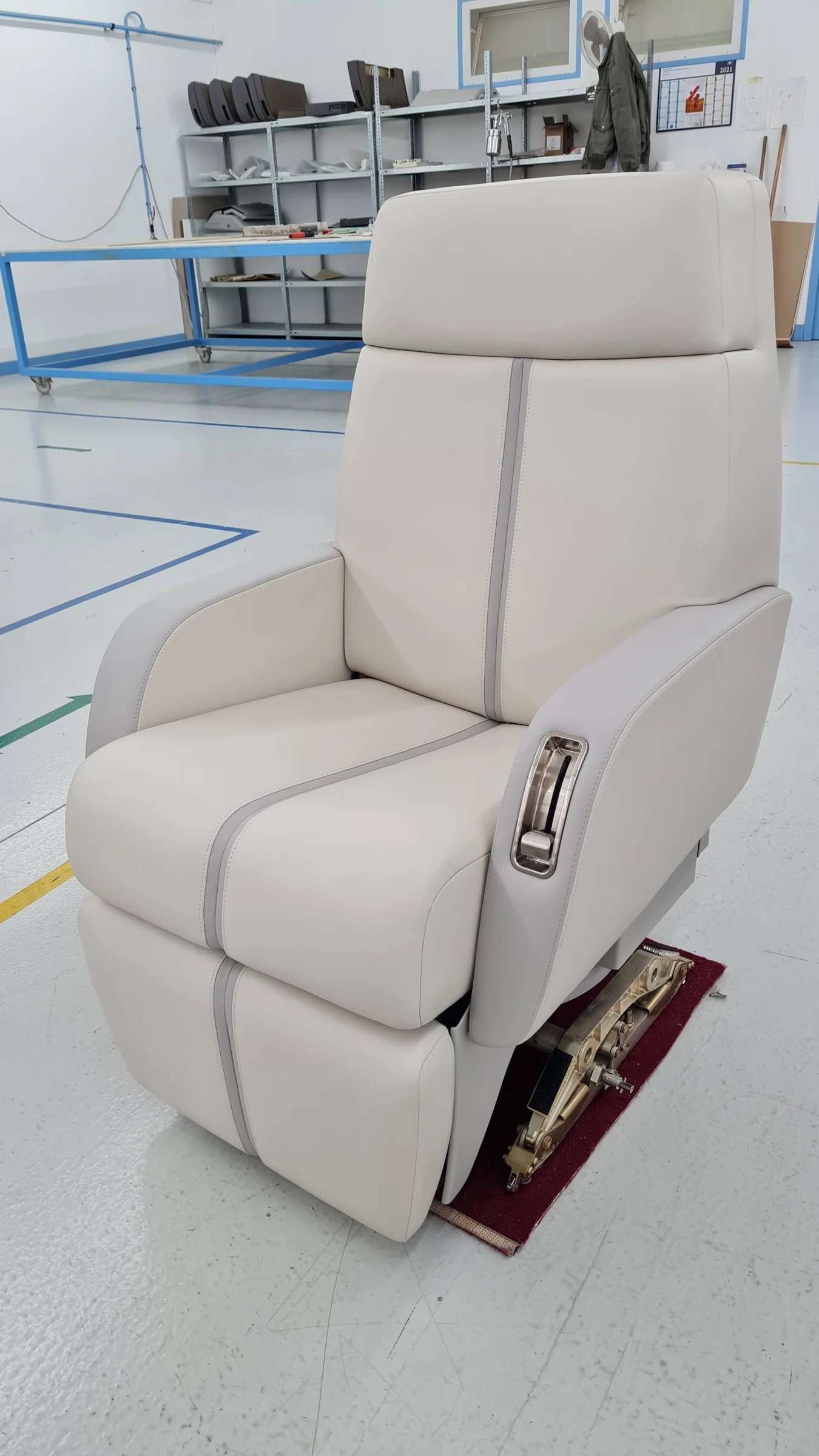 During the work: a reupholstered seat retaining its existing design, before refitting.
